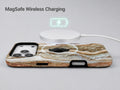 Rose Gold Agate Marble MagSafe Loop iPhone Case shown with a MagSafe-compatible wireless charger attached