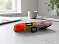 Rose Olive Scarlet Color Block MagSafe Loop iPhone Case shown in a neutral white professional lifestyle setting
