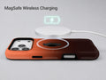 Rust Brown Ombre Gradient MagSafe Loop iPhone Case shown with a MagSafe-compatible wireless charger attached