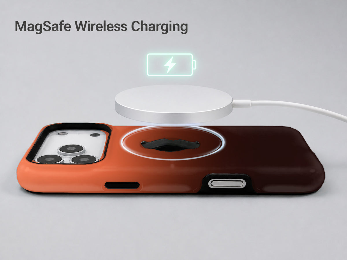 Rust Brown Ombre Gradient MagSafe Loop iPhone Case shown with a MagSafe-compatible wireless charger attached