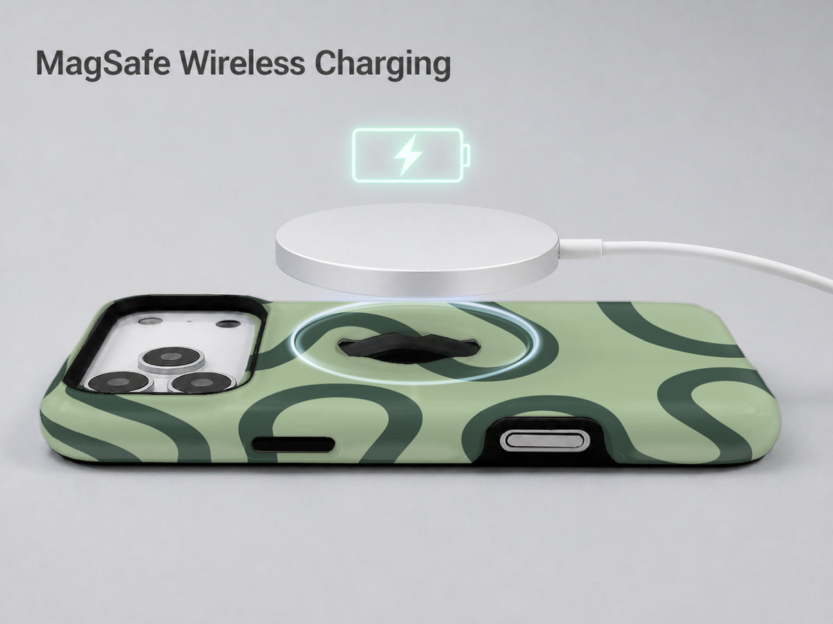 Sage Green Retro Swirl MagSafe Loop iPhone Case shown with a MagSafe-compatible wireless charger attached