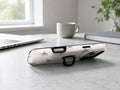 Silver Puffy Star MagSafe Loop iPhone Case shown in a neutral white professional lifestyle setting