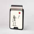 Skeleton with Red Balloon MagSafe Card Holder, card storage shown with cards