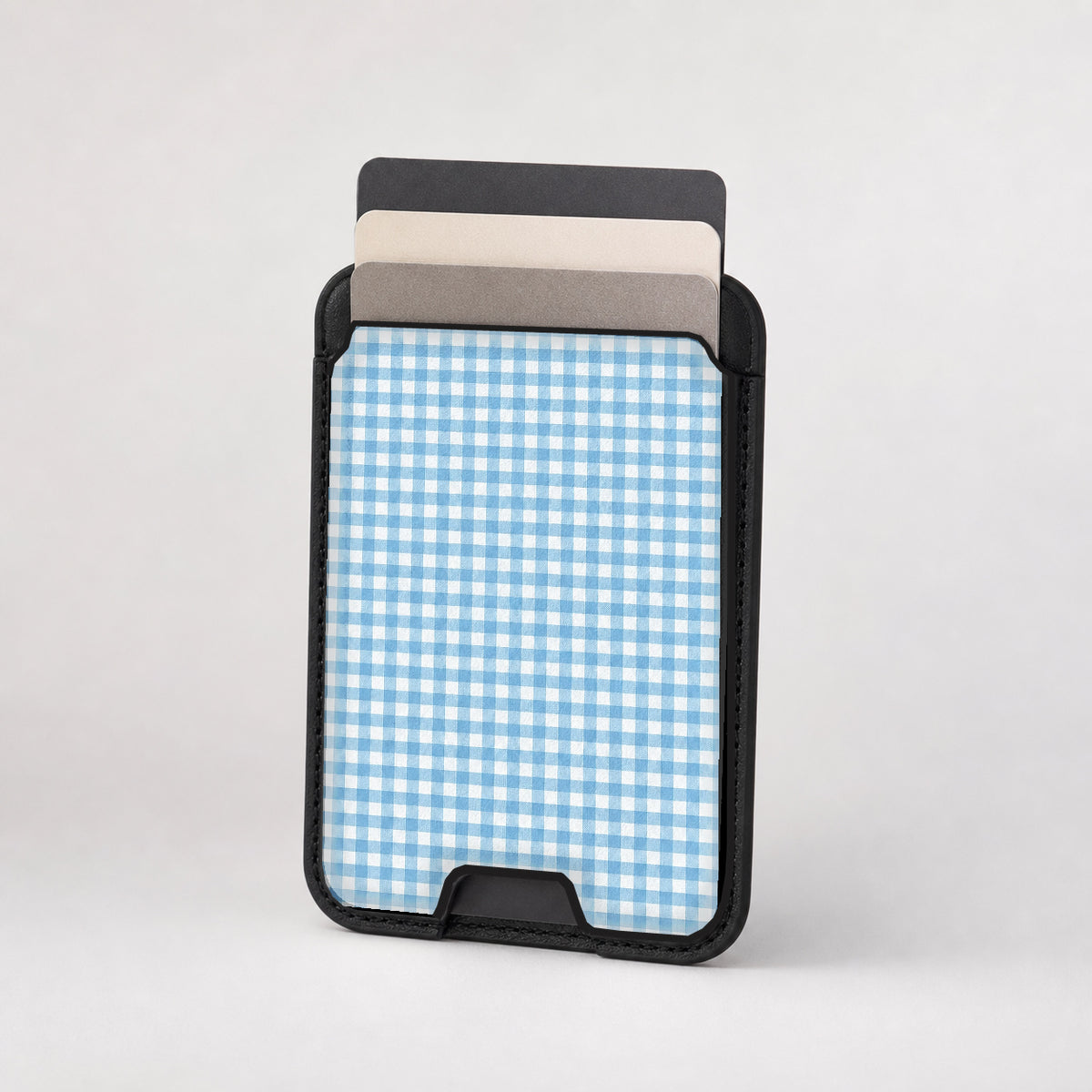 Sky Blue and White Gingham MagSafe Card Holder, card storage shown with cards