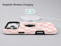 Soft Blush Wavy Checkerboard MagSafe Loop iPhone Case shown with a MagSafe-compatible wireless charger attached
