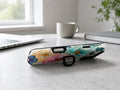Teal Pink Stained Glass Floral MagSafe Loop iPhone Case shown in a neutral white professional lifestyle setting