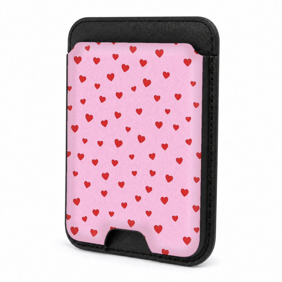 Front view of the Tiny Red Hearts MagSafe card holder on a white background