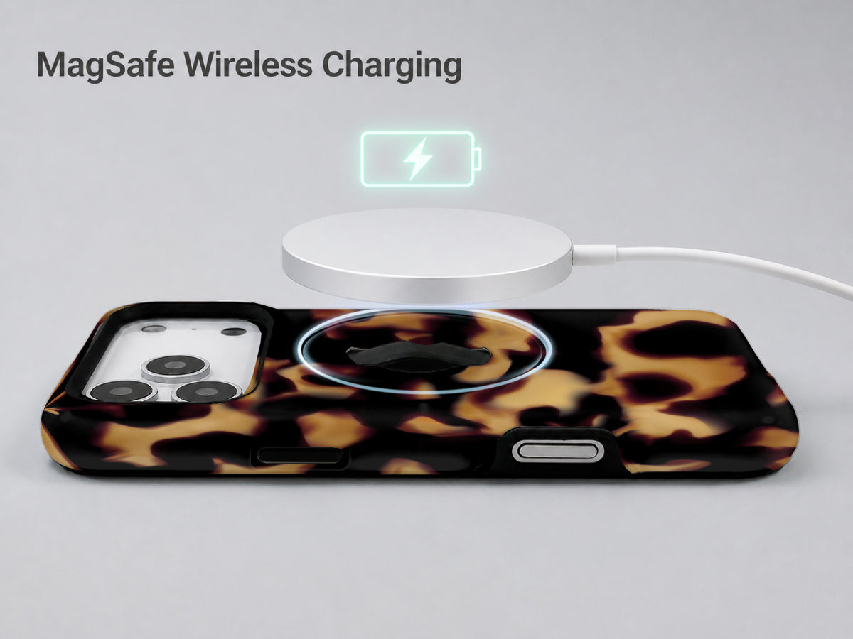 Tortoiseshell MagSafe Loop iPhone Case shown with a MagSafe-compatible wireless charger attached