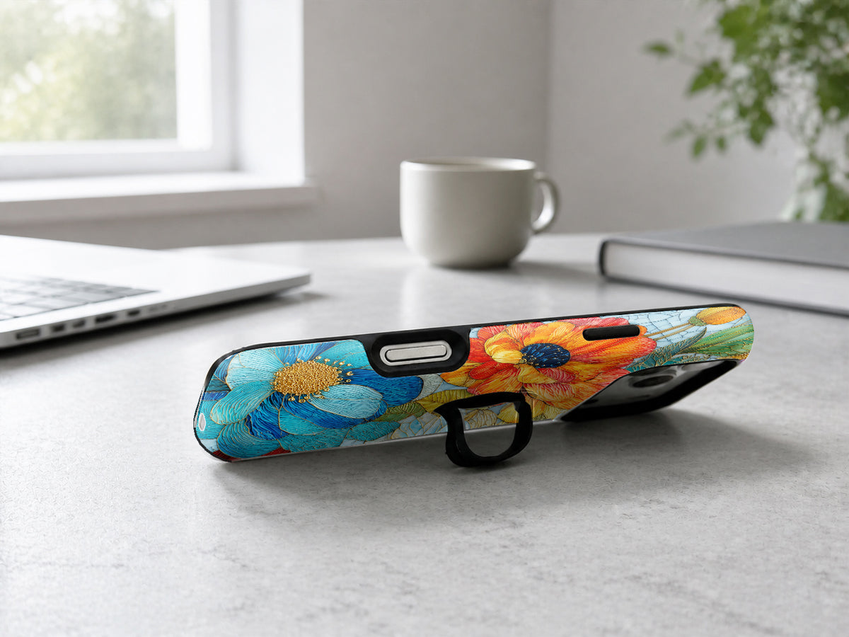 Vibrant Poppy Stained Glass MagSafe Loop iPhone Case shown in a neutral white professional lifestyle setting