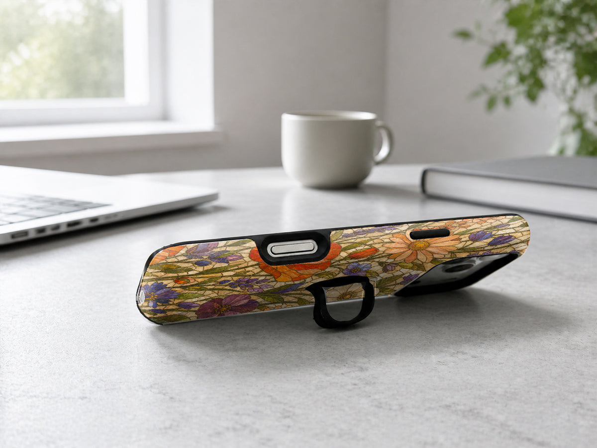 Vintage Autumn Wildflower MagSafe Loop iPhone Case shown in a neutral white professional lifestyle setting