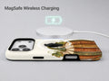 Vintage Book Pumpkin MagSafe Loop Case, shown with a MagSafe wireless charger