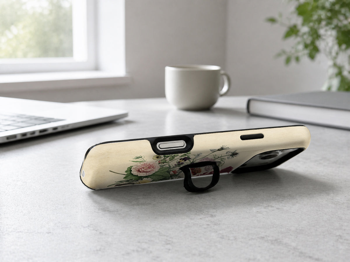 Vintage Botanical Bouquet MagSafe Loop iPhone Case shown in a neutral white professional lifestyle setting
