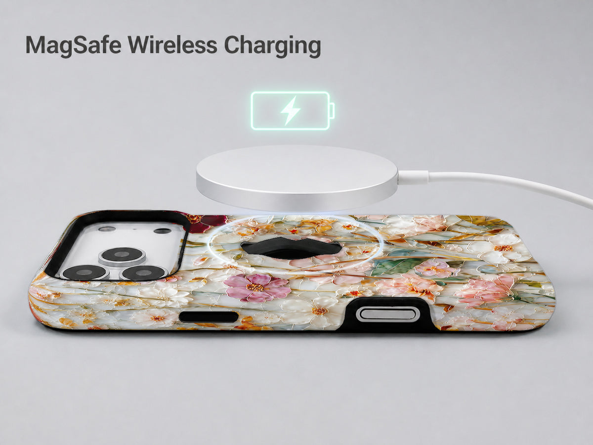 Warm Wildflower Stained Glass MagSafe Loop iPhone Case shown with a MagSafe-compatible wireless charger attached