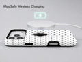 White Black Mini Polka Dot MagSafe Loop iPhone Case shown with a MagSafe-compatible wireless charger attached