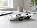 White Black Mini Polka Dot MagSafe Loop iPhone Case shown in a neutral white professional lifestyle setting